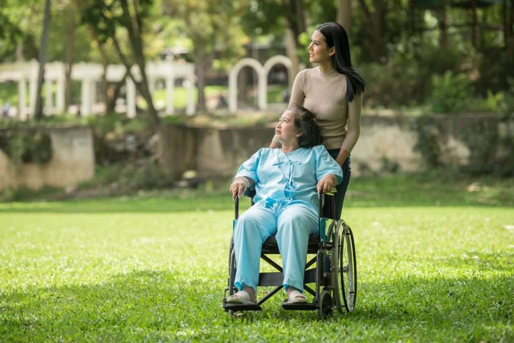 women on a stroll with wheelchair