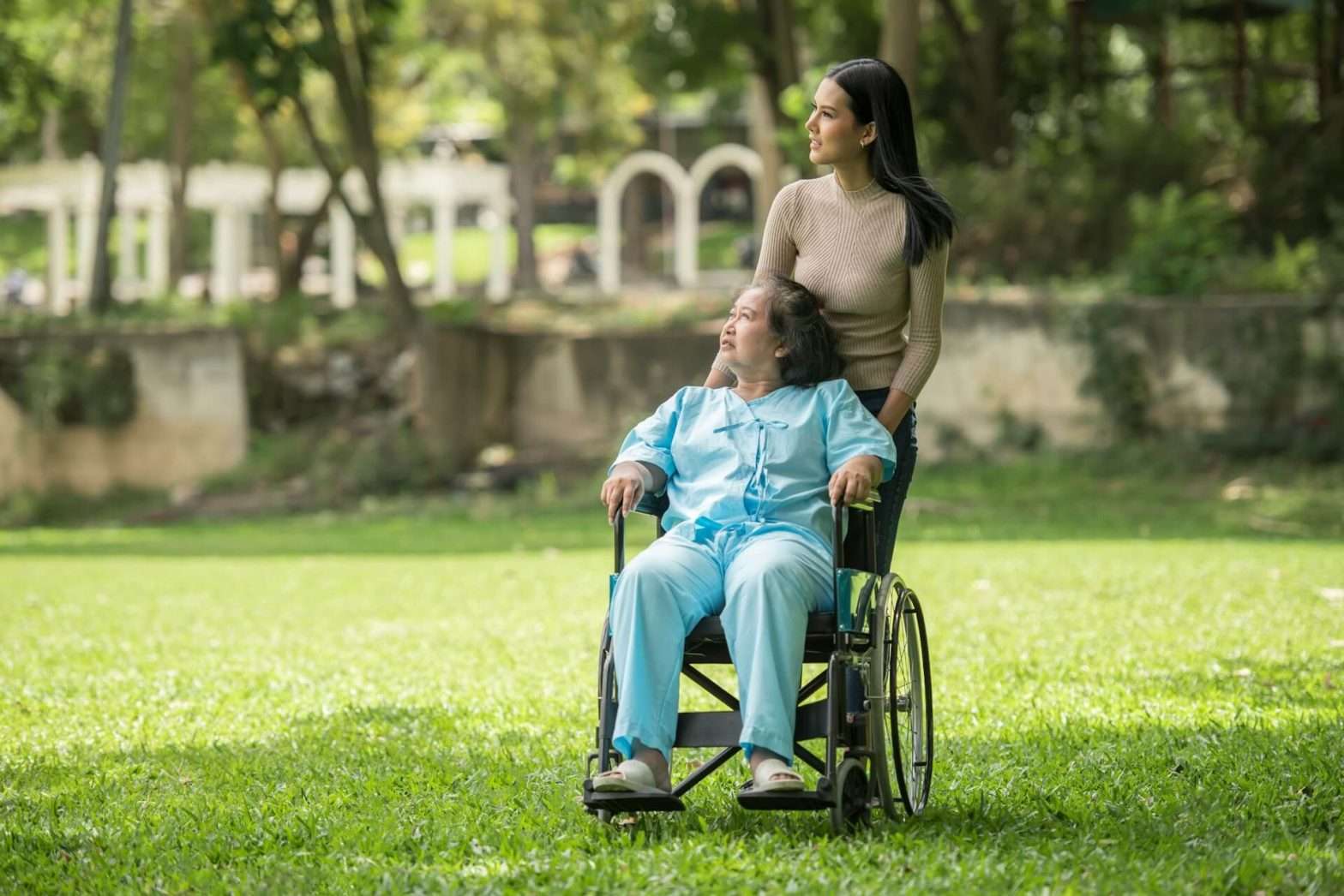 women on a stroll with wheelchair